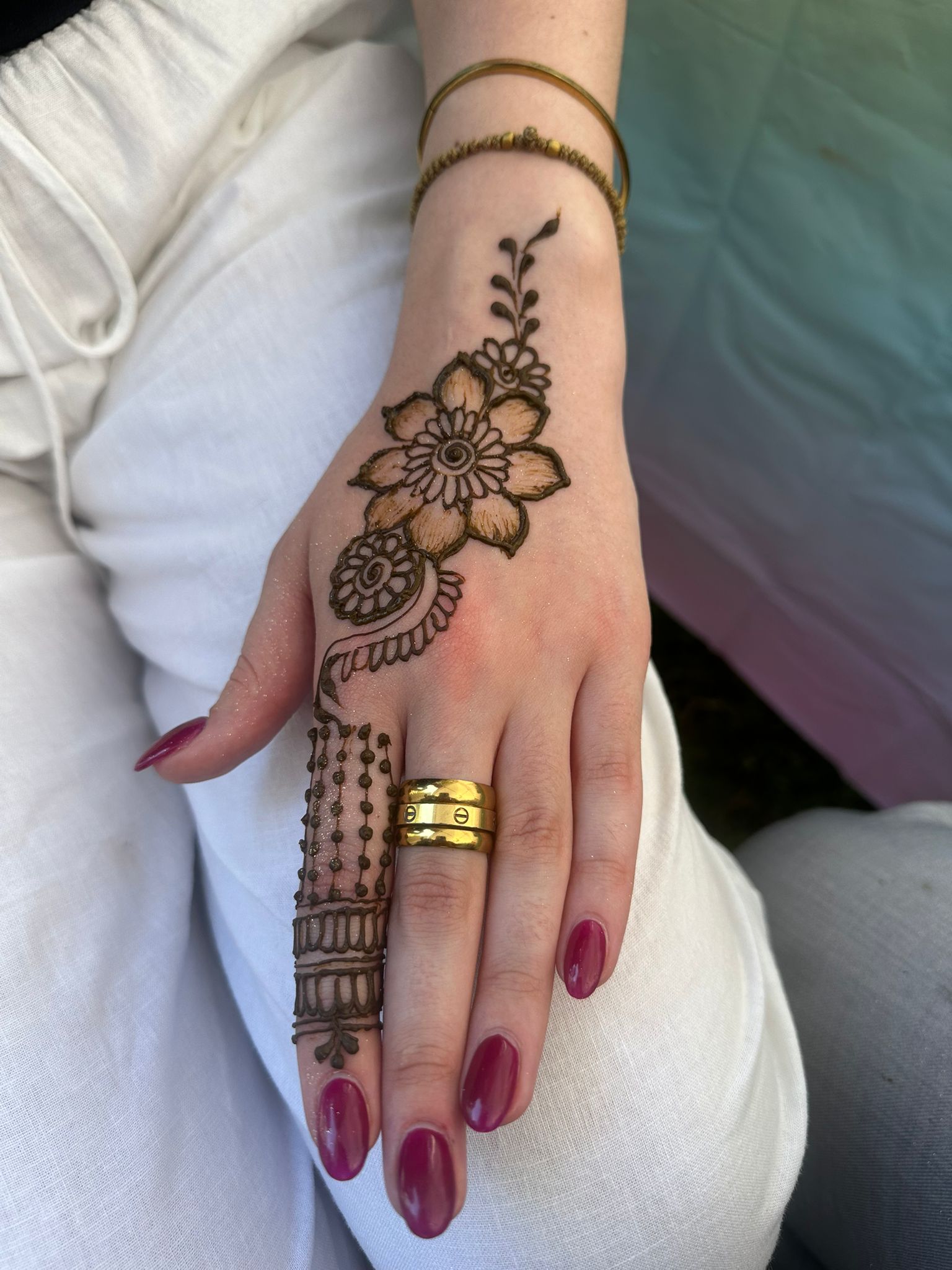 Fantasy Facez — intricate henna