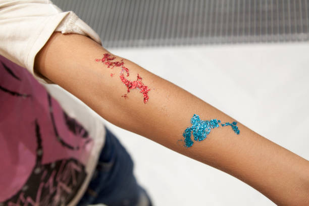 Glitter tattoo designs by Fantasy Facez
